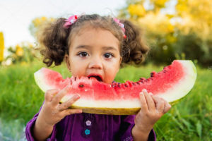 Image of girl eating watermelon