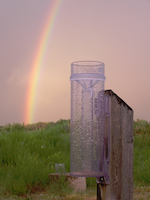 rainbow and rain gauge